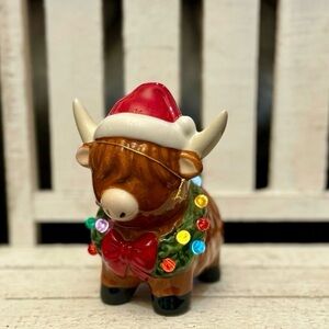 Festive highland cow Figurine with Santa Hat